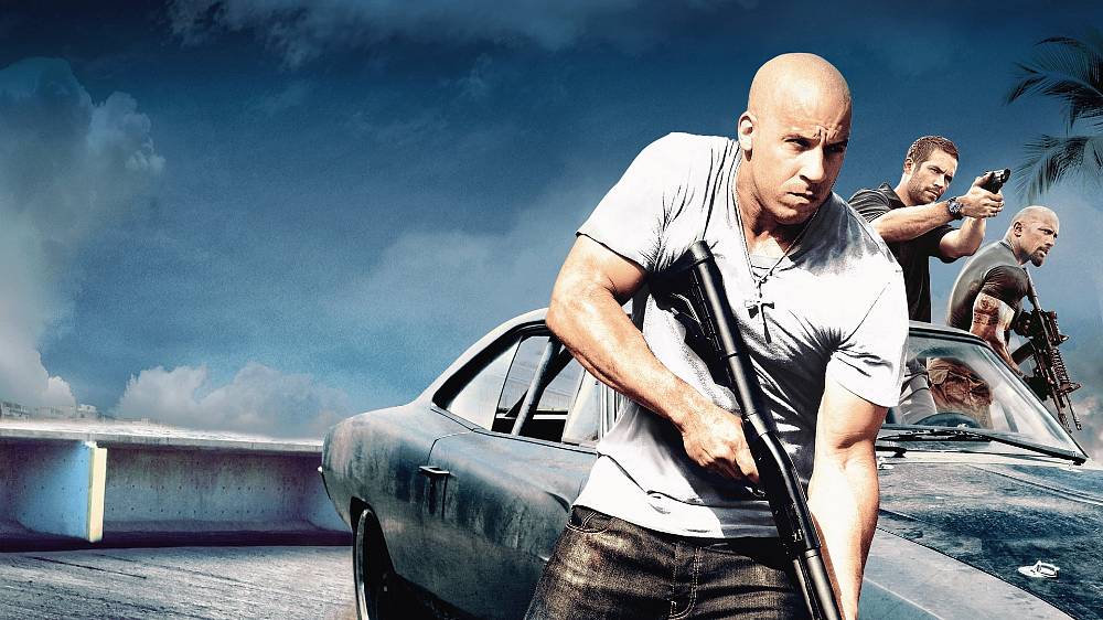 Rychle a zběsile 5 (2011). Legendární Dom Toretto (Diesel) se v exotickém Rio de Janeiru spojuje s bývalým policajtem Brianem O’Connerem (Walker), který nyní stojí na opačné straně zákona. V patách mají bezcitného agenta Hobbse (Dwayne Johnson) a armádu zkorumpovaných policajtů pracujících pro krutého narkobarona. Toretto a O’Conner znovu svolávají gang z předchozích rychlých a zběsilých dobrodružství, aby se společně pustili do posledního úkolu – šílené loupeže v hodnotě sto milionů dolarů!