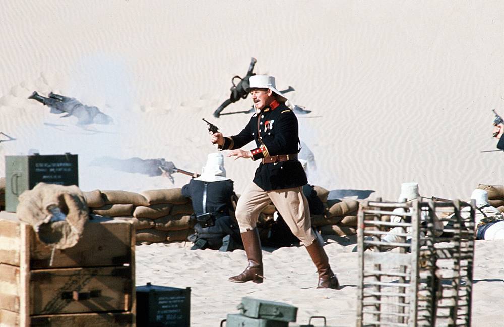 Pochoduj nebo zemři: Gene Hackman a Terenc Hill ve filmu, kvůli kterému letadla přepravovala tuny písku z Maroka do USA